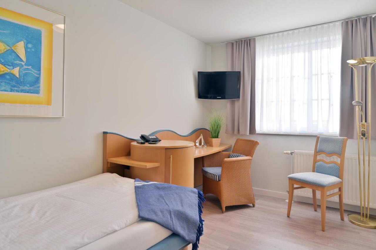 Hotel- & Ferienanlage Kapitaens-Haeuser 브리게 외부 사진